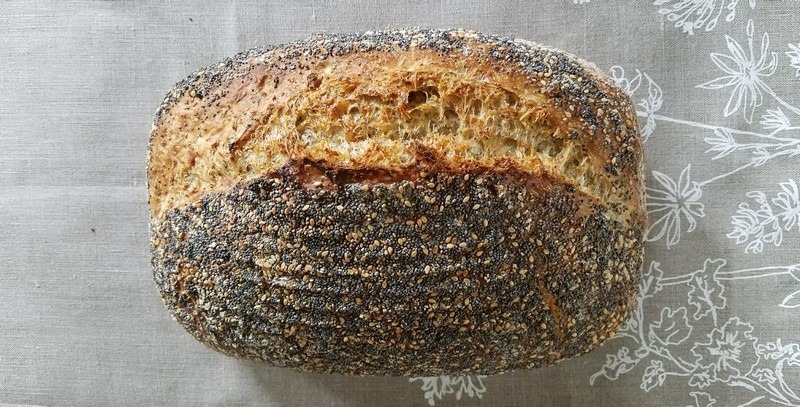 With chia, poppy, and toasted sesame seeds, this bread smells delicious and is full of flavor. The crust is crackly and the crumb is soft and chewy.