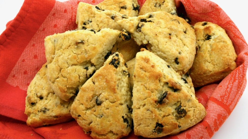 These delightfully light buttermilk scones are delicious by themselves but particularly festive with a good creamy butter, Devonshire cream, lemon curd, or jam. This is an easy recipe to whip up for brunch or tea. You can have them on the table in about half an hour, from start to finish.