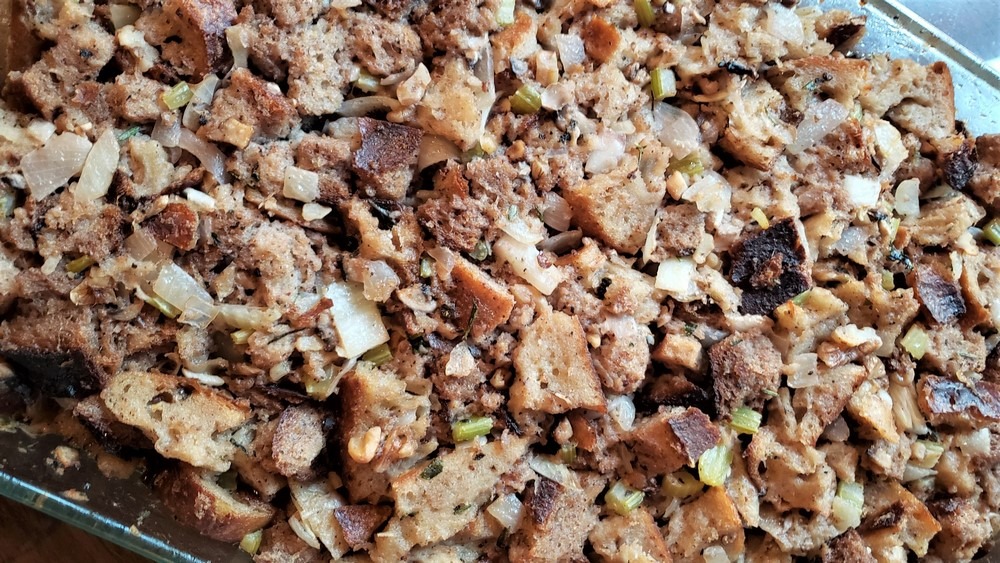 This is the best Thanksgiving stuffing I've ever made or eaten. The cubed sourdough bread and bountiful herbs impart such delicious flavors that you'll want to make it year-round.