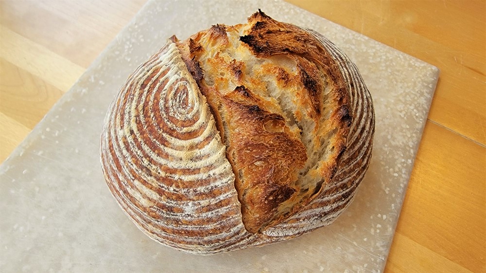 You can make this basic all purpose flour sourdough bread recipe into beautiful crusty artisan-style bread or a soft and tender sandwich bread. You can choose either a 1-day process baking in the evening or an overnight refrigeration of the dough for a morning bake. It's simple, easy to follow, and the results are delicious.