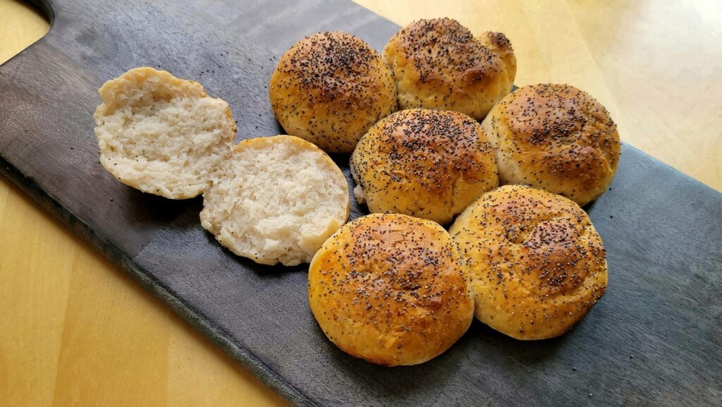This simple recipe yields wonderfully soft and delicious gluten free dinner rolls. Check out the photos to see the steps, and feel free to scale up the ingredients to make more rolls, or shape them as hamburger or hot dog buns.