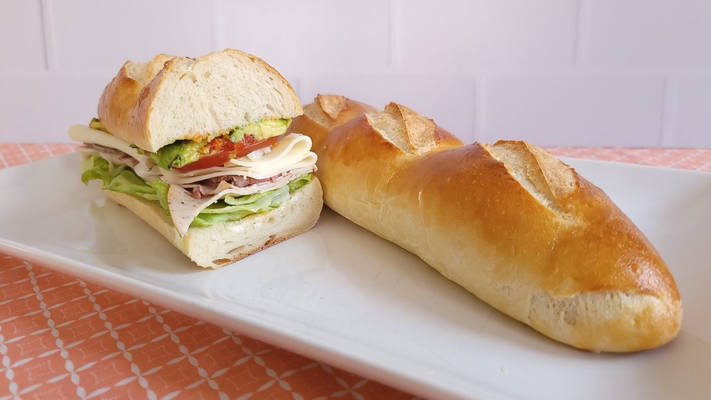 Subs, grinders, hoagies… ever get a hankering for those long, soft, squishy “french breads” that you get from a sandwich shop or delicatessen? We’ve got you covered. Make homemade super soft French bread for sandwiches using this beginner-friendly recipe.