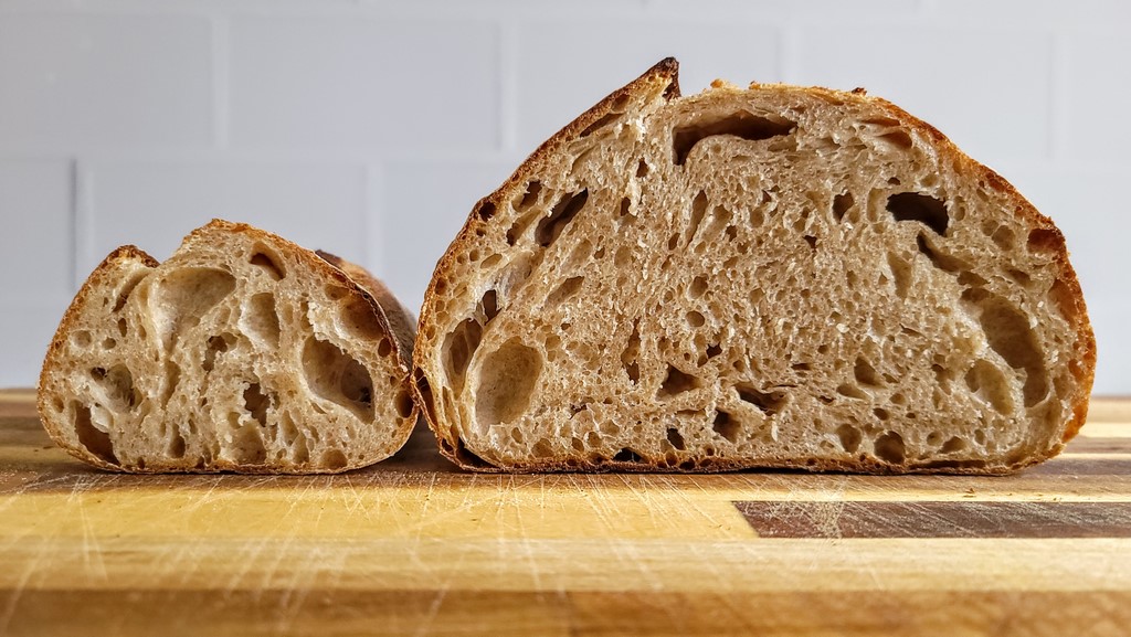 Ever notice that you seem to get a more open crumb with smaller loaves? In this series of experiments, we made large batches of dough and then divided them into differently sized and shaped loaves while otherwise striving to treat them as close to identically as we could to see how these size and shaping differences affect the resulting crumb.
