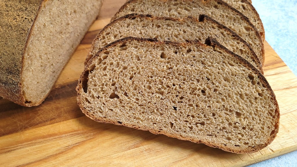 Adding psyllium husk and extra water to a whole wheat dough is an easy way to increase the fiber content of bread while also making the slices more tender and pliable (think great sandwich bread). Try this recipe with hard white spring wheat or another whole grain flour of your choosing.